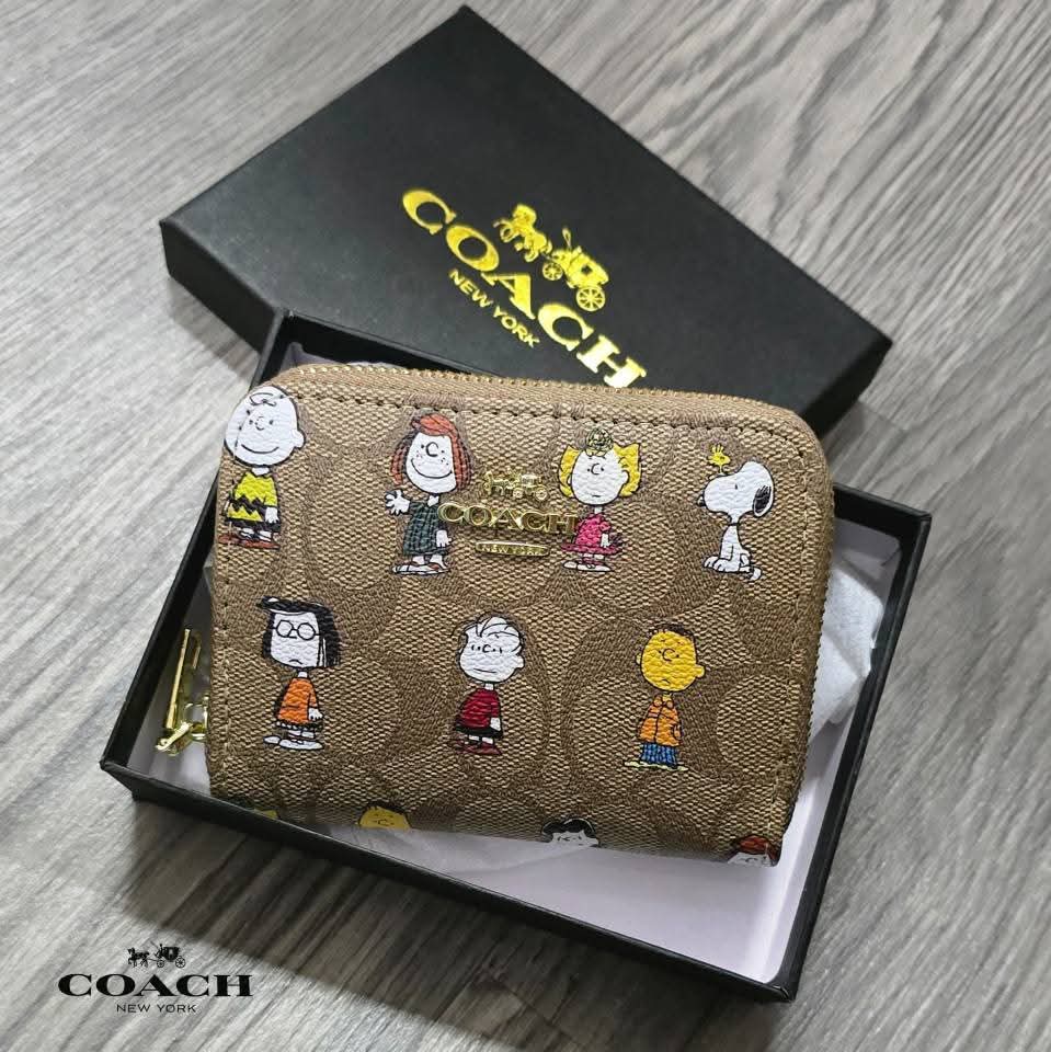 MONEDERO COACH SNOOPY Y SUS AMIGOS