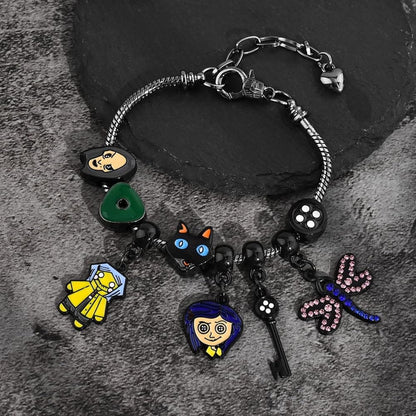 pulsera de charms inspirada en Coraline
